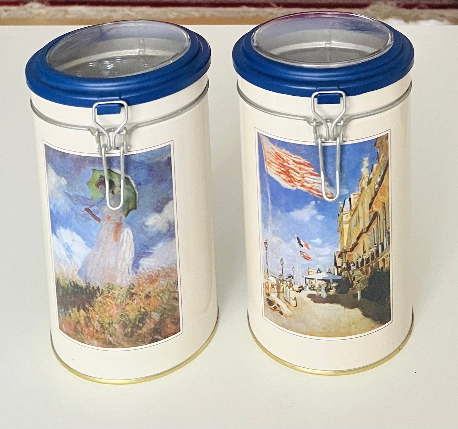 Twee  decoratieve metalen blikken , Claude Monet., Ophalen of Verzenden, Overige
