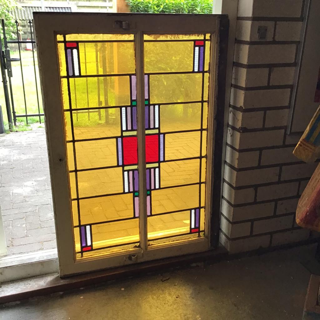 Schitterend glas in lood raam, Ophalen