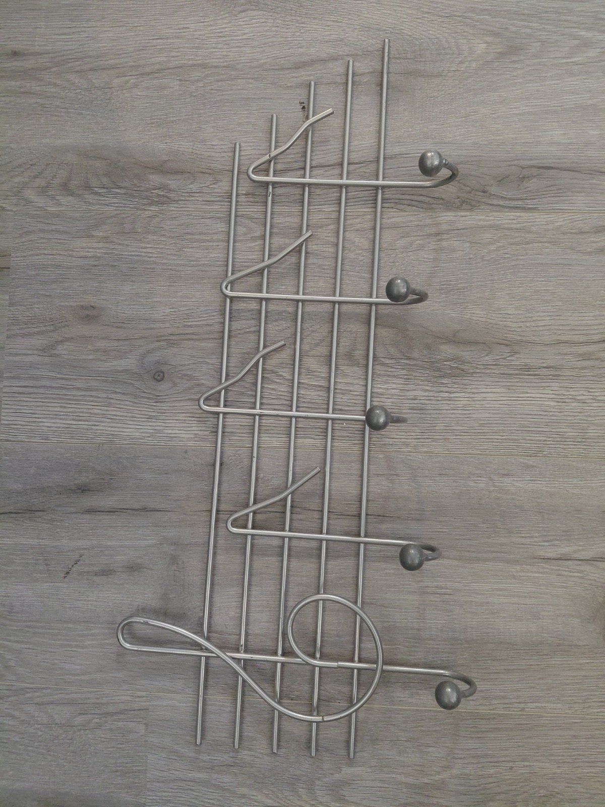 Metalen wandkapstok met muzieknoot design, Wandkapstok, Gebruikt, Ophalen of Verzenden, Minder dan 100 cm