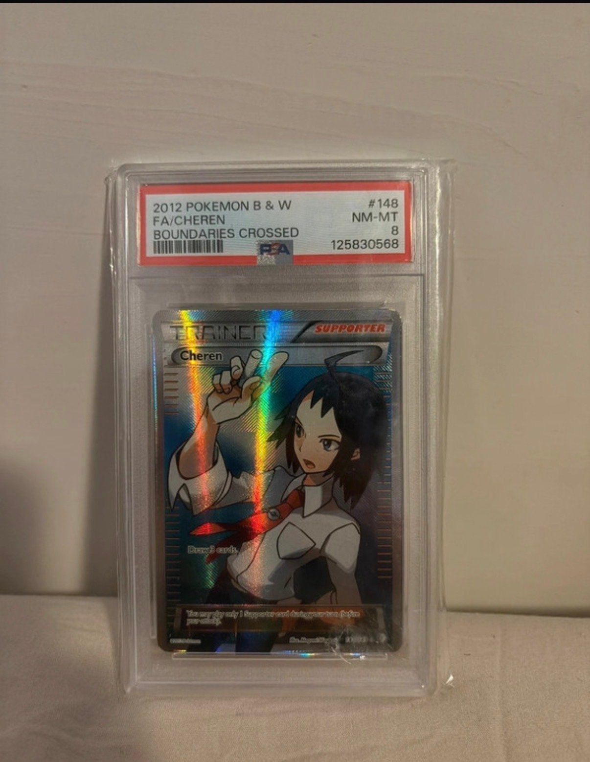 PSA 8 Cheren Full Art 2012 Pokémon B&W Boundaries Crossed, Ophalen of Verzenden, Zo goed als nieuw, Losse kaart, Foil