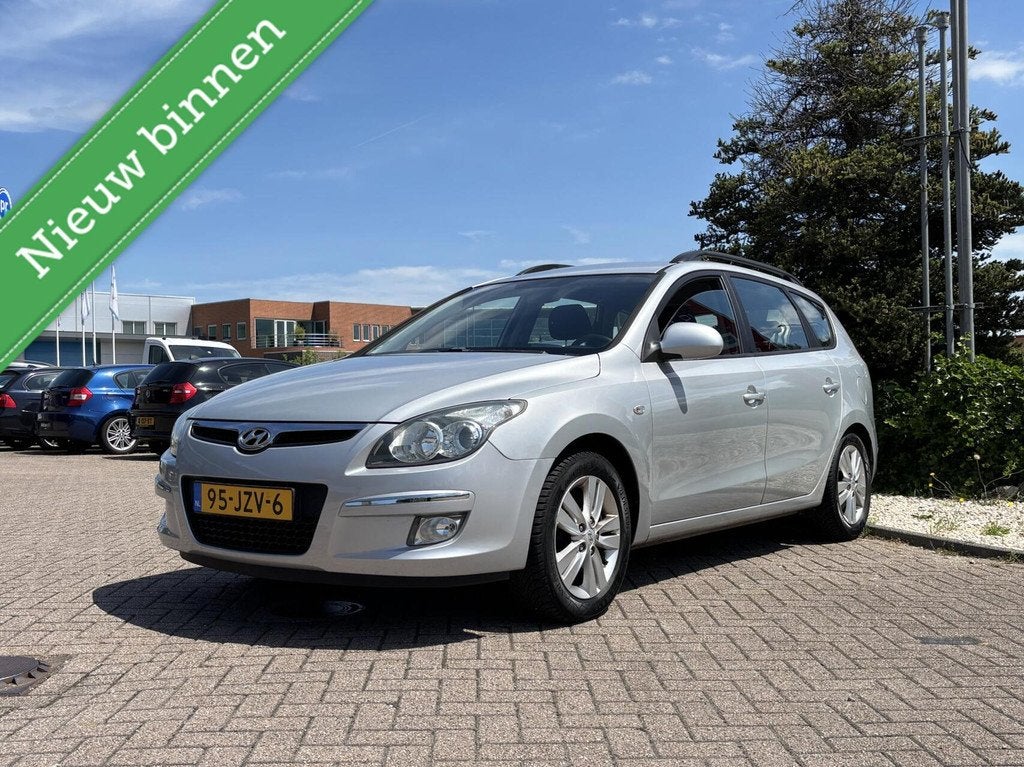 Hyundai i30 CW 1.4i Blue Dynamic, Trekhaak, Airco, Clima!, Auto's, Voorwielaandrijving, Stof, Zwart, 4 cilinders