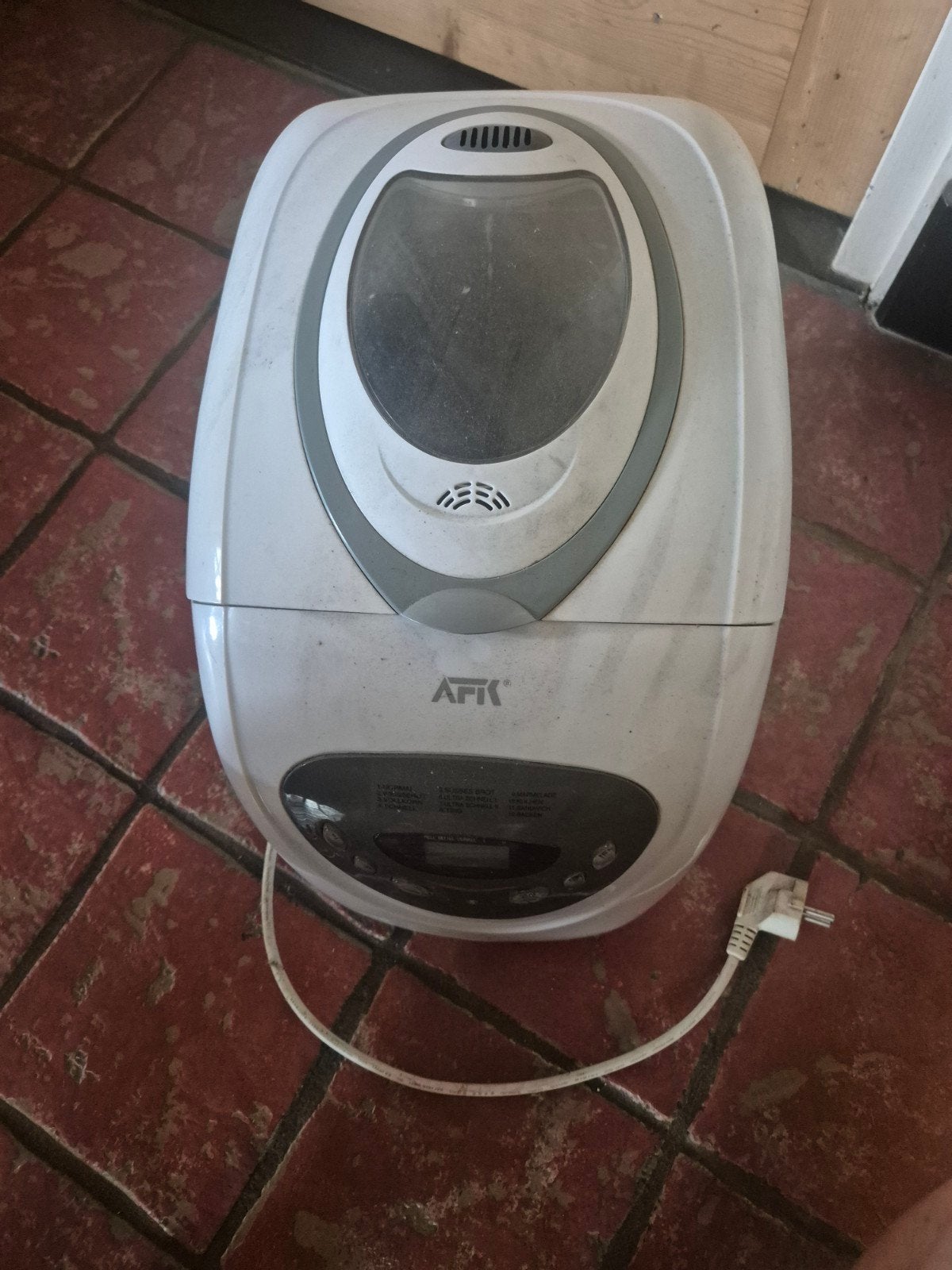 Afk broodbakmachine, Ophalen
