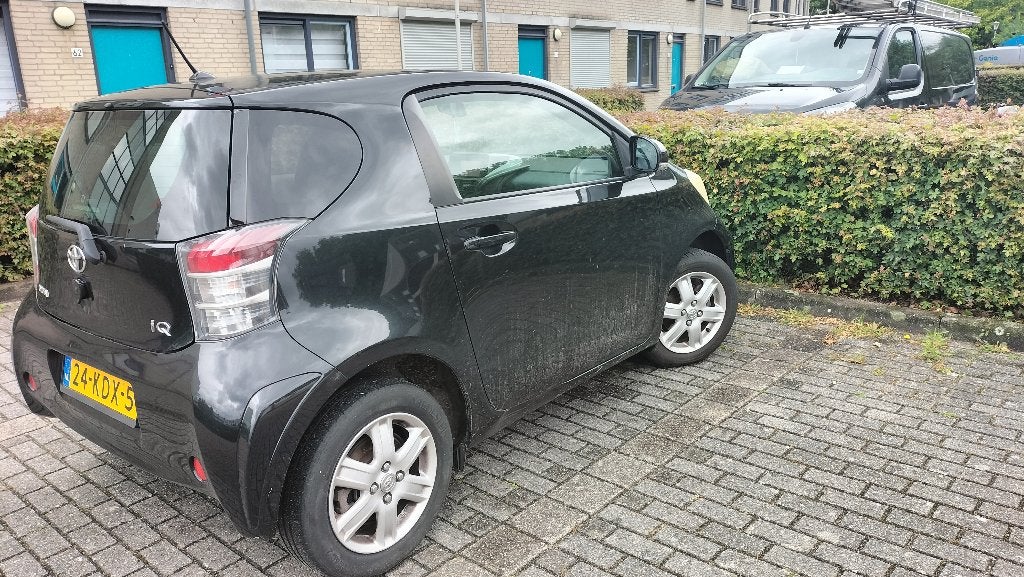Toyota IQ 1.0 2009 Zwart, Auto's, Origineel Nederlands, Overige kleuren, Handgeschakeld, 3 cilinders