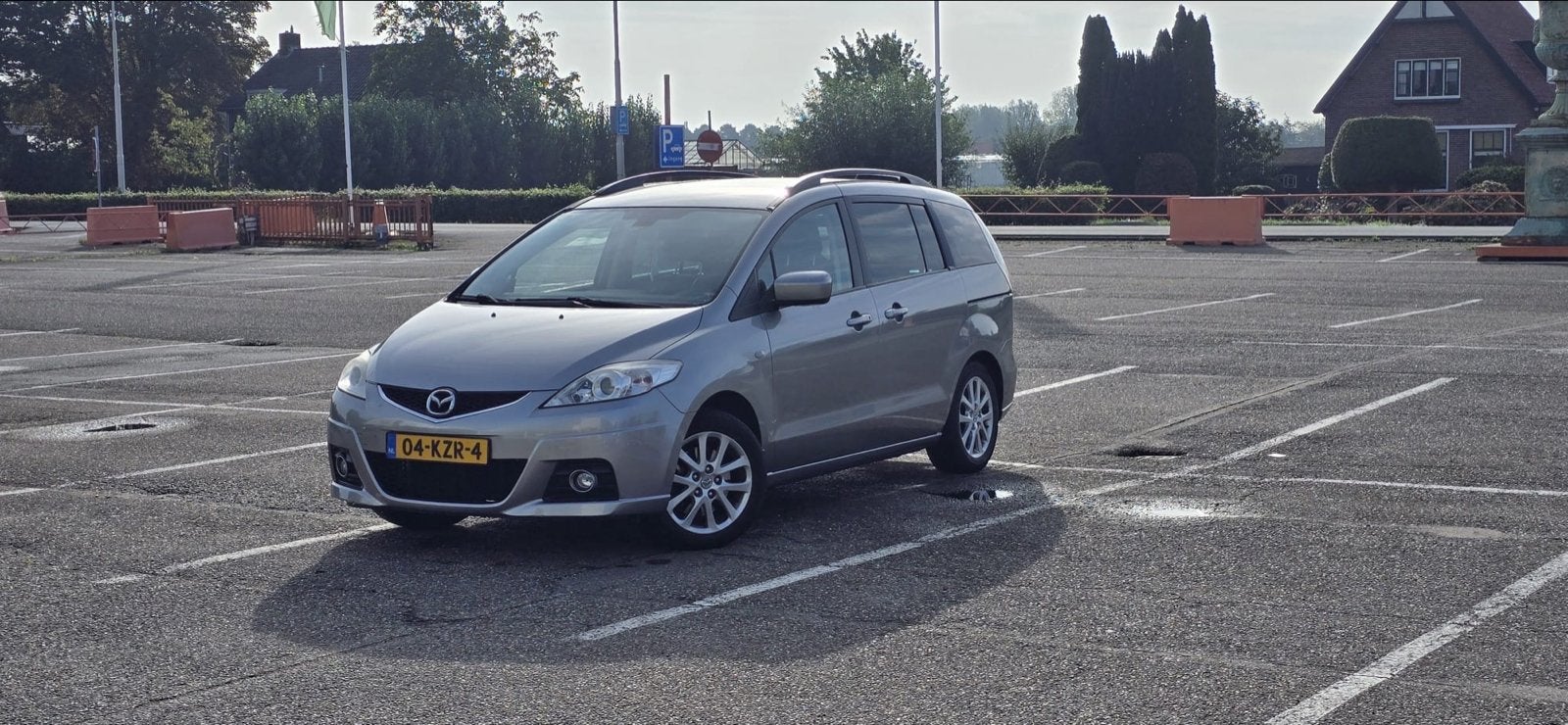 Mazda 5 1.8 7-persoons | 1e eigenaar, Carplay, stoelverwarmd, Auto's, Stof, Zwart, 4 cilinders, 7 stoelen
