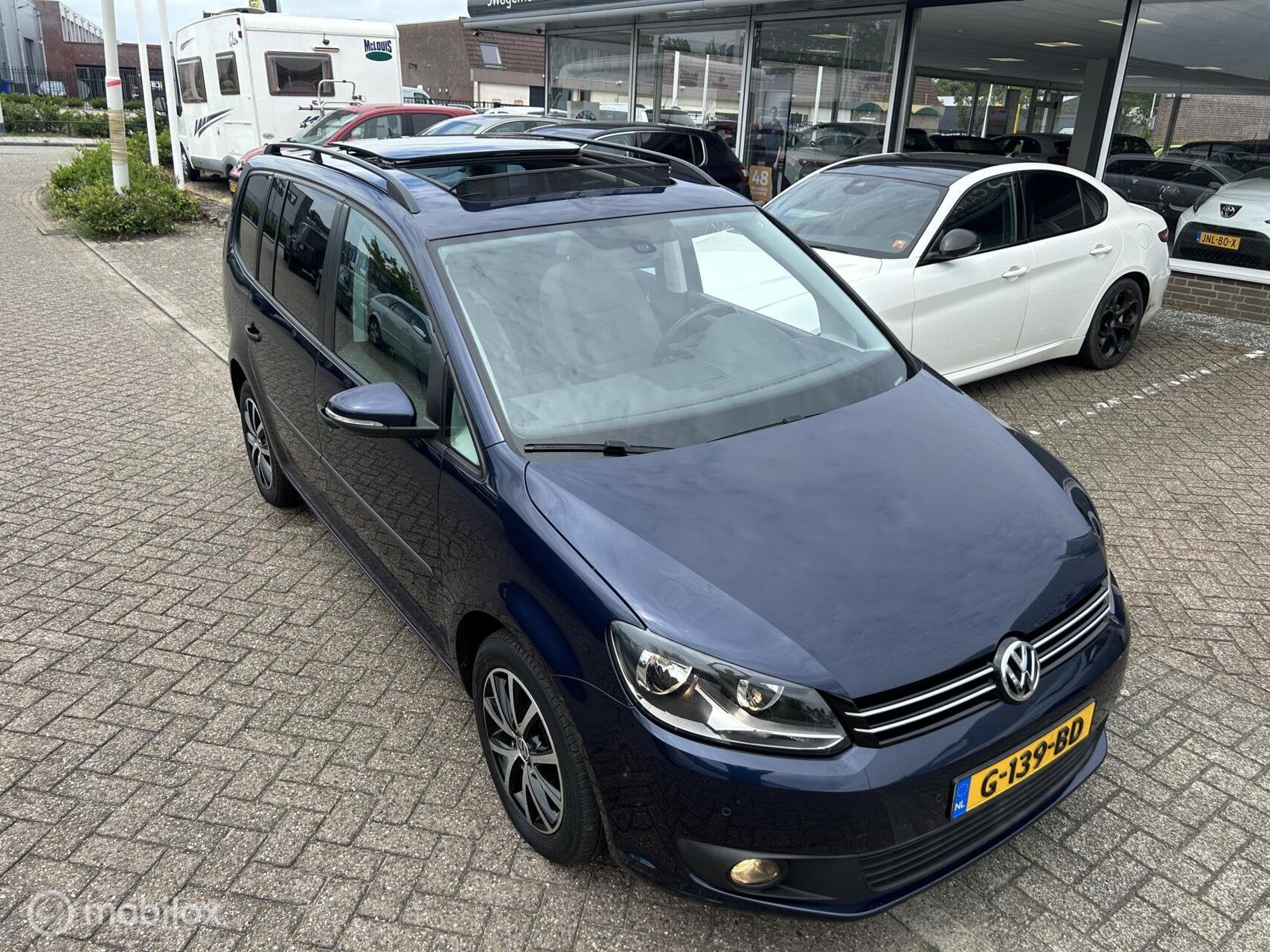 Volkswagen Touran 1.4 TSI Highl. 7p Automaat Pano, Euro 5, 15 km/l, Gebruikt, 4 cilinders