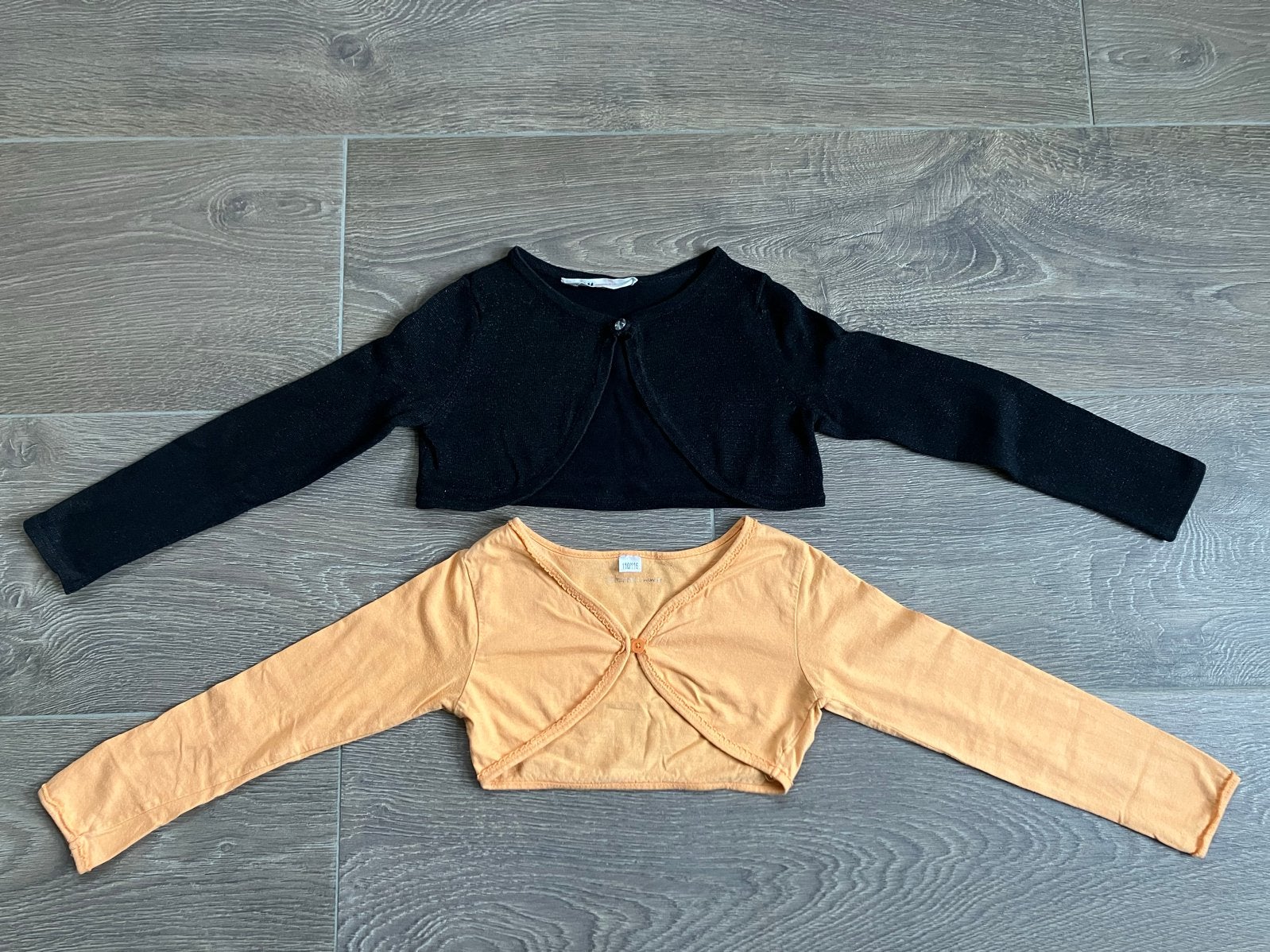 Bolero vestjes - Oranje en Zwart/glitter 110 116, Ophalen of Verzenden, Gebruikt, Meisje, Trui of Vest