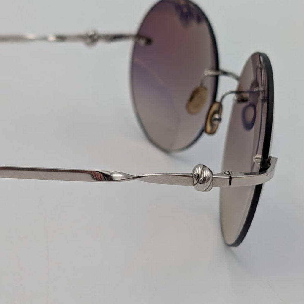Cartier Trinity Vintage knot zonnebril met Cartier glazen, Cartier, Zo goed als nieuw, Support@cartier.com, 13 Rue de la Paix, 75002 Paris
France