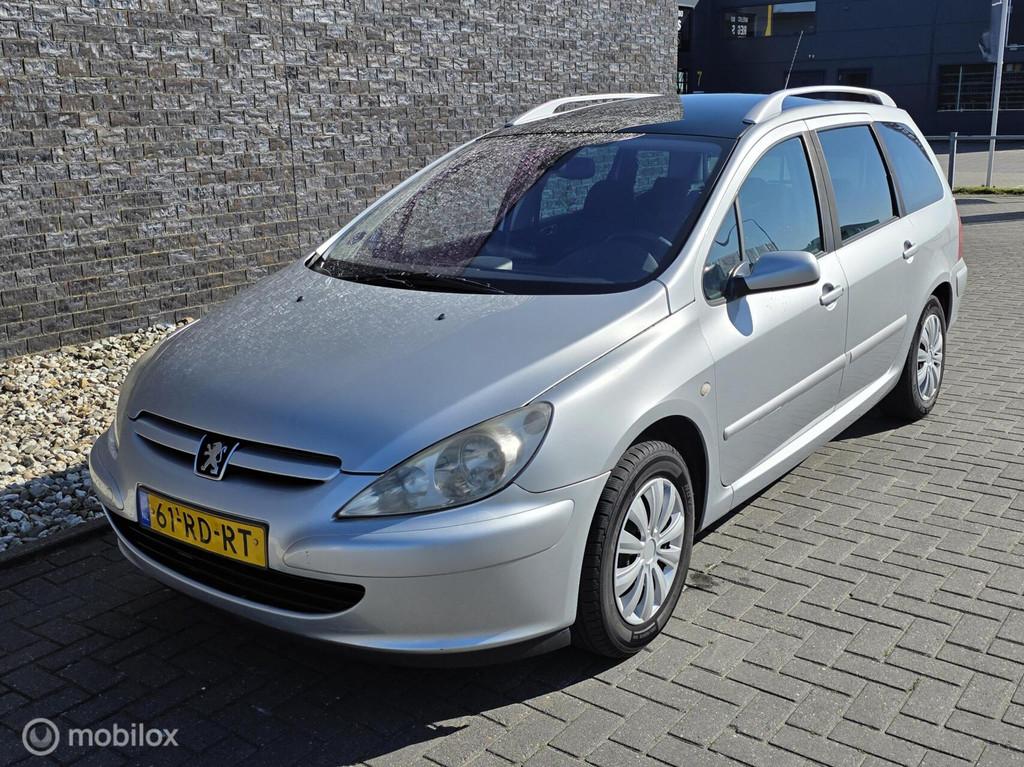 Peugeot 307 SW 1.6 16V Airco - 7 Pers - Trekhaak - Nw apk!, Gebruikt, 4 cilinders, Startonderbreker, Origineel Nederlands