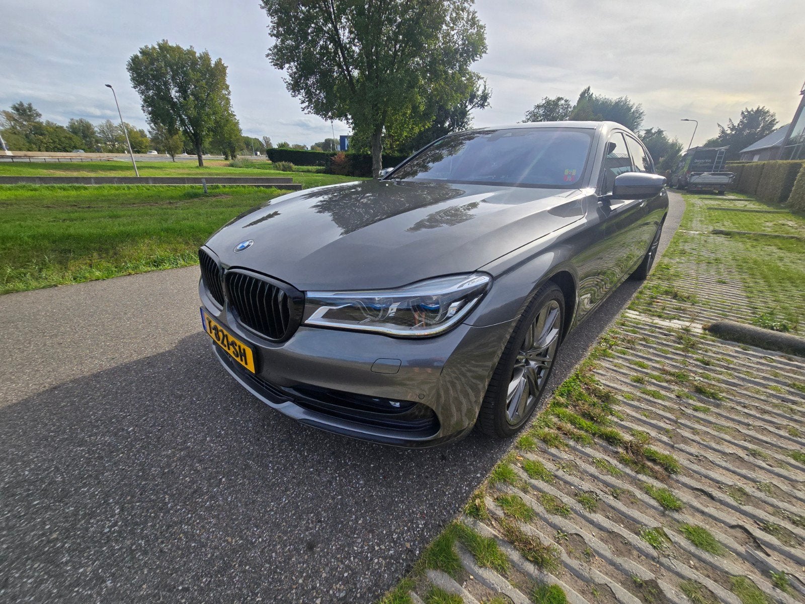 BMW 7-Serie 4.4 750 LI X-drive AUT 2016 Grijs, Automaat, 8 cilinders, Leder, Bruin