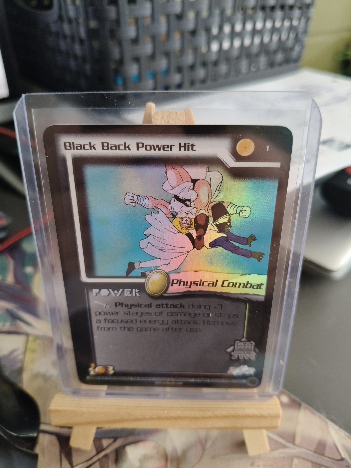Dragon Ball Z TCG - Holograpic Black Back Power Hit, Ophalen of Verzenden, Zo goed als nieuw, Losse kaart, Foil