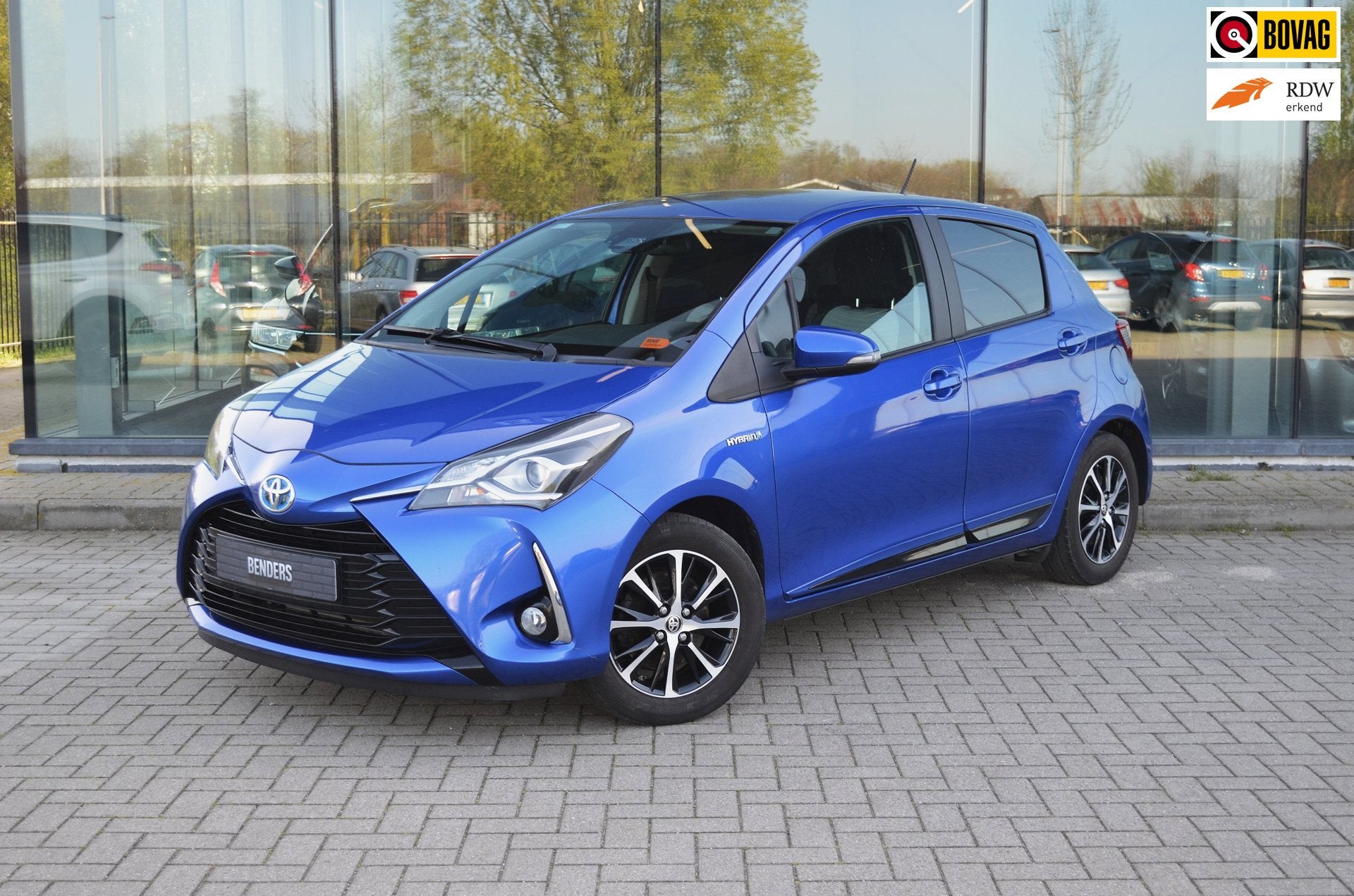 Toyota Yaris 1.5 Hybrid Dynamic | Cruise | stoel verw. | Cam, Auto's, Stof, Zwart, Overige carrosserieën, Blauw