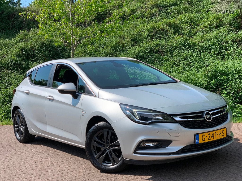 Opel Astra 1.0 Turbo 120 Jaar Edition 23DKM NIEUWSTAAT !, Gebruikt, Euro 6, 610 kg, Origineel Nederlands