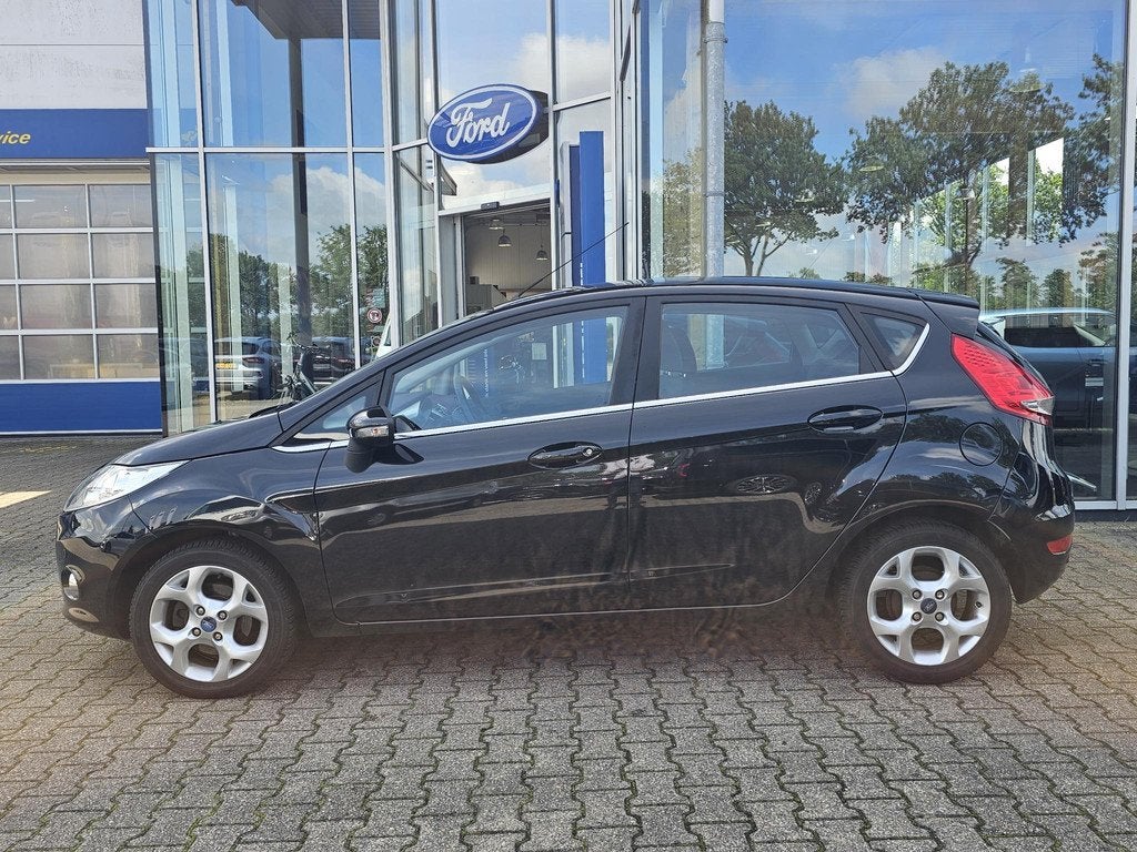 Ford Fiesta 1.25 Titanium Nette en goed onderhouden auto | A, Auto's, Voorwielaandrijving, Stof, 82 pk, Zwart