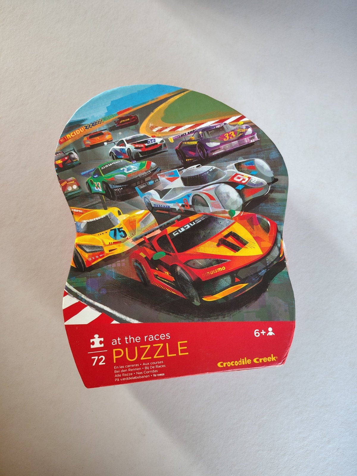 Crocodile Creek Puzzel 'At the Races' 72 stukjes, Ophalen of Verzenden, Meer dan 50 stukjes, Zo goed als nieuw, 6 jaar of ouder