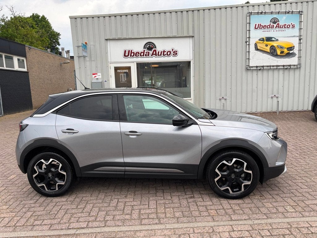 Opel Mokka 1.5 Ultimate DIESEL 1E EIGENAAR NL AUTO KM 91925, Auto's, Opel, Voorwielaandrijving, 1195 kg, 4 cilinders, Leder en Stof