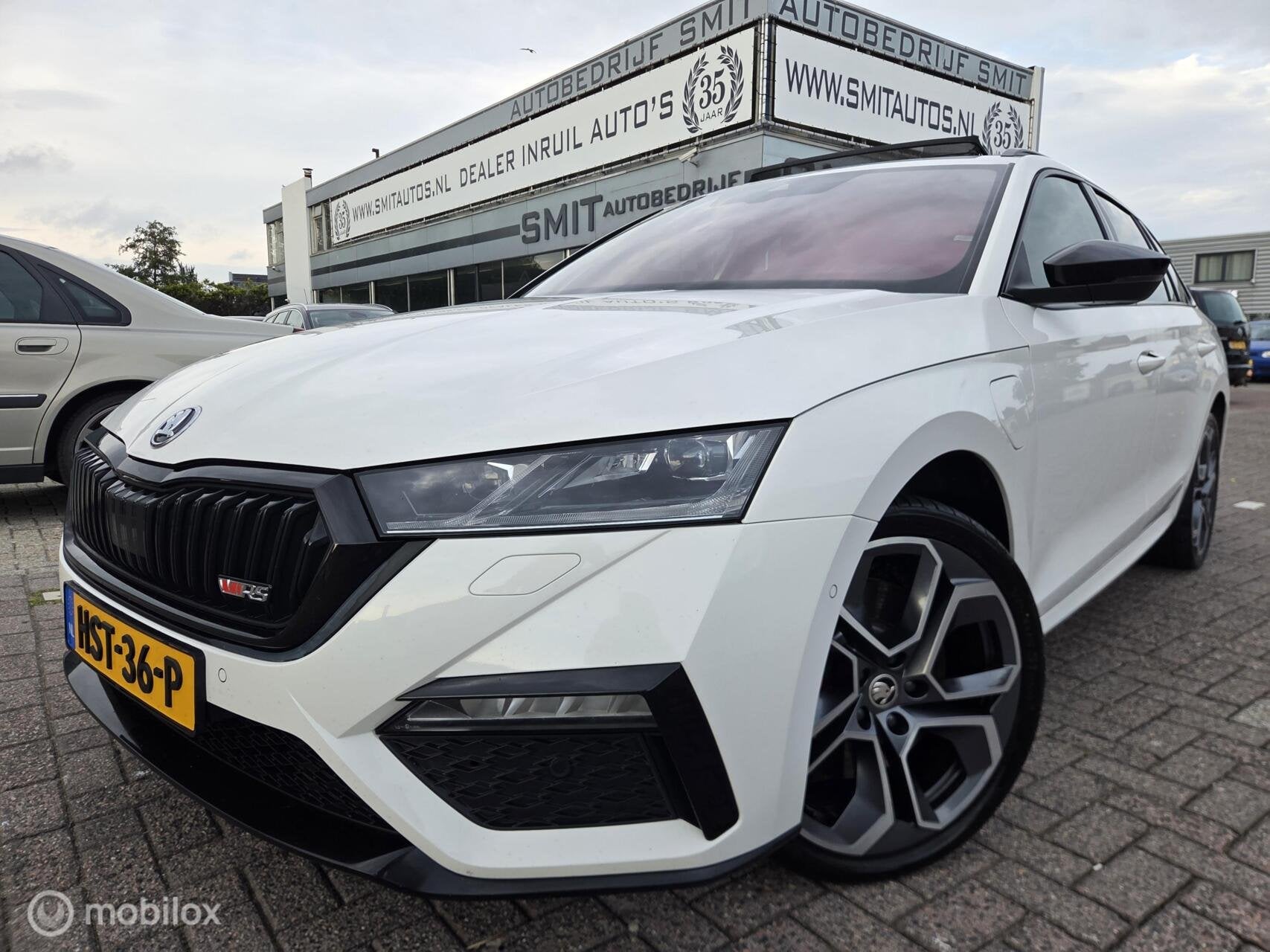 Skoda Octavia Combi 1.4 TSI RS iV PHEV Business HeadUp/Pano, Auto's, Gebruikt, 4 cilinders, Wit, Hybride Elektrisch/Benzine