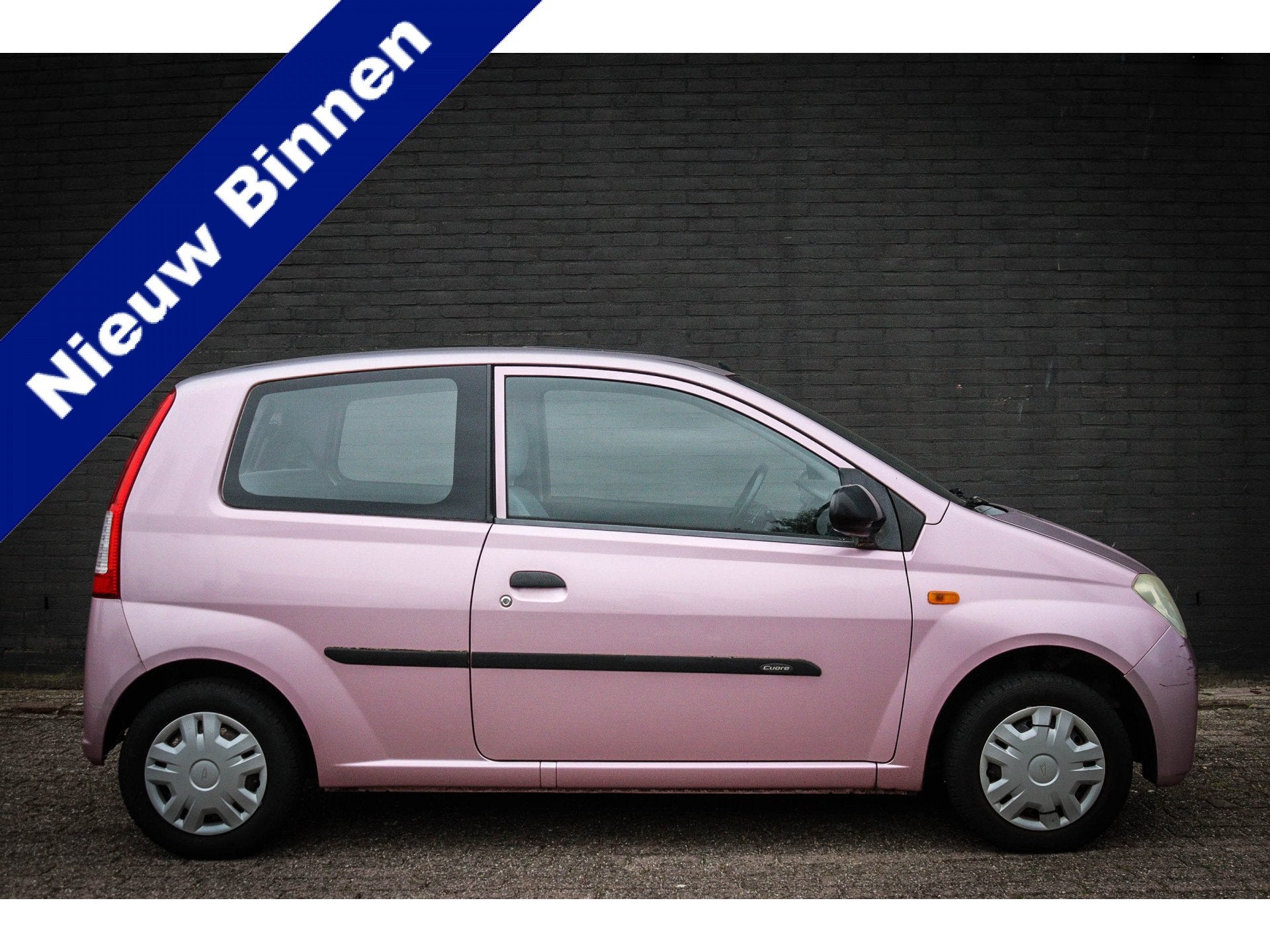 Daihatsu Cuore 1.0-12V Tokyo Net binnen-Nu al te bezichtigen, Auto's, Daihatsu, Stof, Zwart, 18 €/maand, Origineel Nederlands