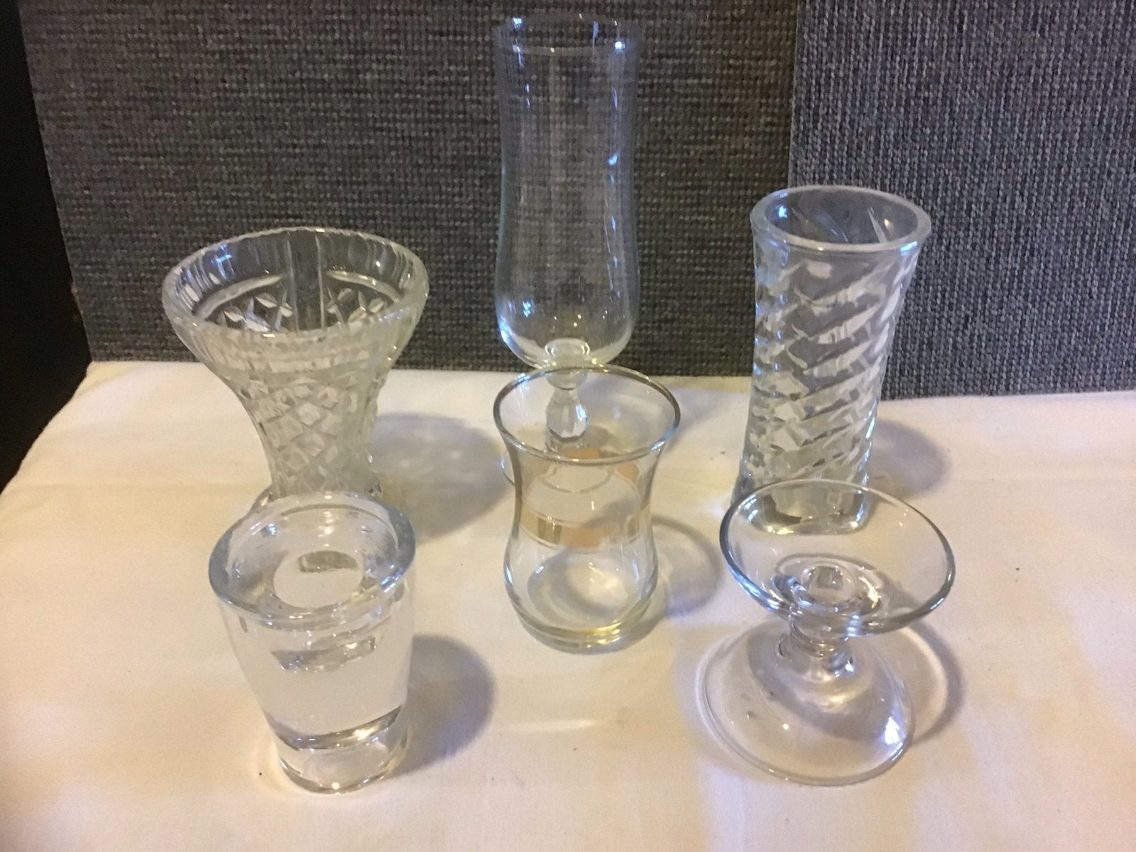4 vaasjes en 2 kaarsenstandaards, Ophalen of Verzenden