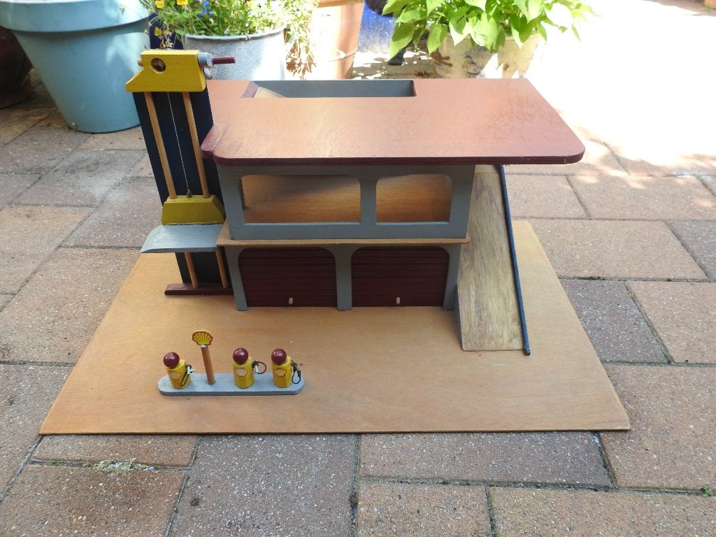 Houten Garage, Ophalen