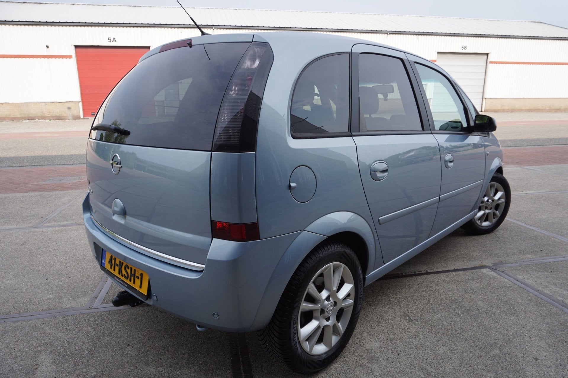Opel Meriva 1.6-16V Cosmo, Auto's, Gebruikt, Zwart, 4 cilinders, Parkeersensor