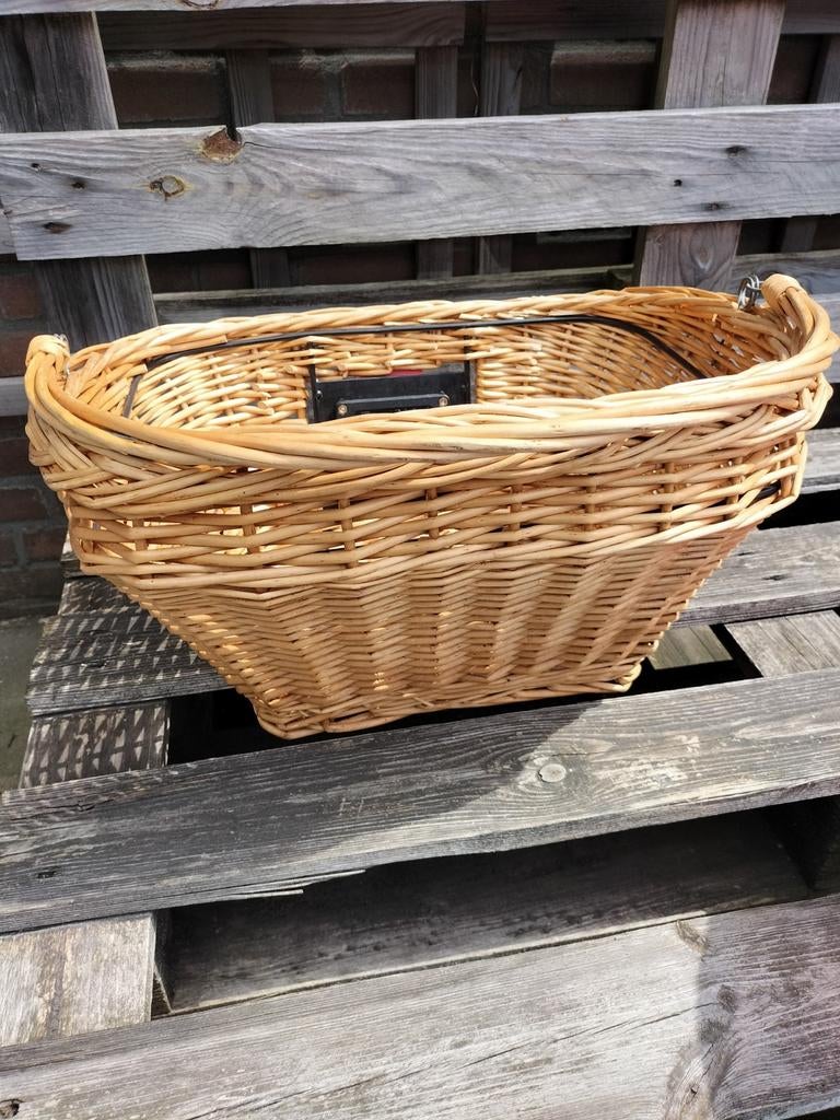 Rotan fietsmand, Ophalen