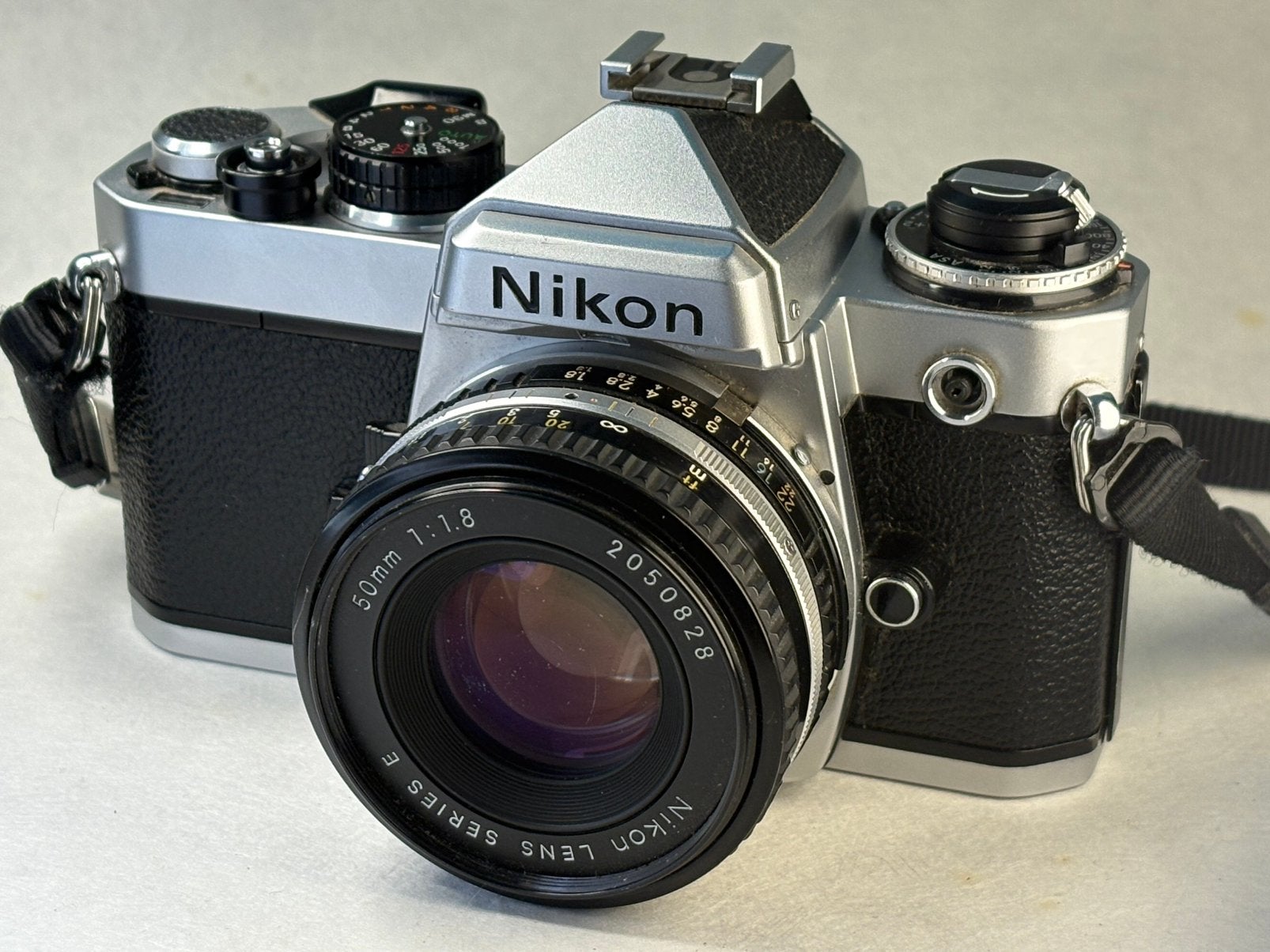 Nikon FE + Nikon 50mm f/1.8 Series E, Audio, Tv en Foto, Fotocamera's Analoog, Ophalen of Verzenden, Gebruikt, Spiegelreflex, Nikon