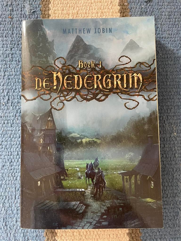 Matthew Jobin - De Nedergrim - Boek 1, Boeken, Ophalen of Verzenden, Zo goed als nieuw, Matthew Jobin