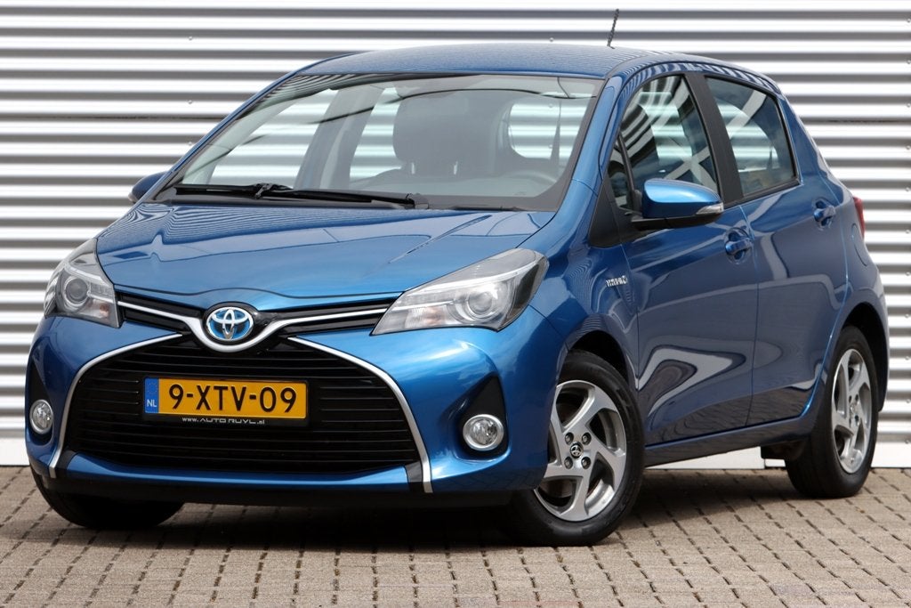 Toyota Yaris 1.5 Hybrid Aspiration Design 1e. Eigenaar, Auto's, 1497 cc, Gebruikt, 4 cilinders, Blauw