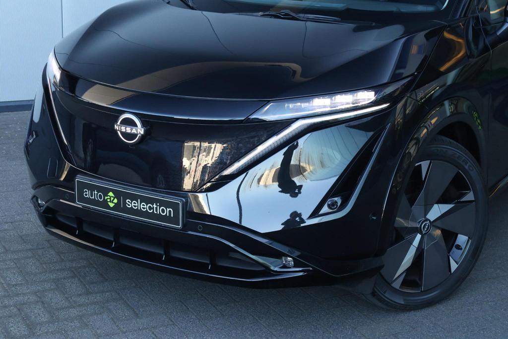 Nissan Ariya e-4ORCE Evolve 91 kWh Panorama / 360 cam / Memo, Auto's, Nissan, Automaat, Stof, Gebruikt, 110 €/maand