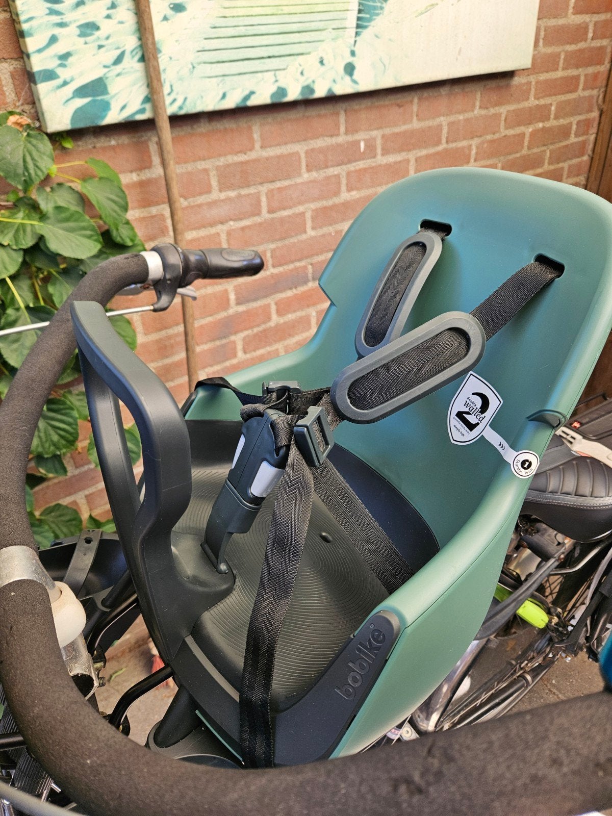 Nieuw fietsstoeltje Bobike + baby helm, Ophalen, Voetsteuntjes, 0 t/m 18 kg, Voorzitje