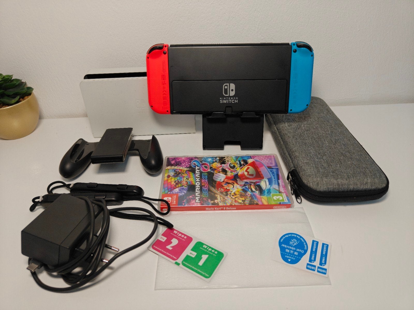 Nintendo Switch OLED met Mario Kart 8 Deluxe, Racen en Vliegen, Ophalen of Verzenden, Zo goed als nieuw, 3 spelers of meer