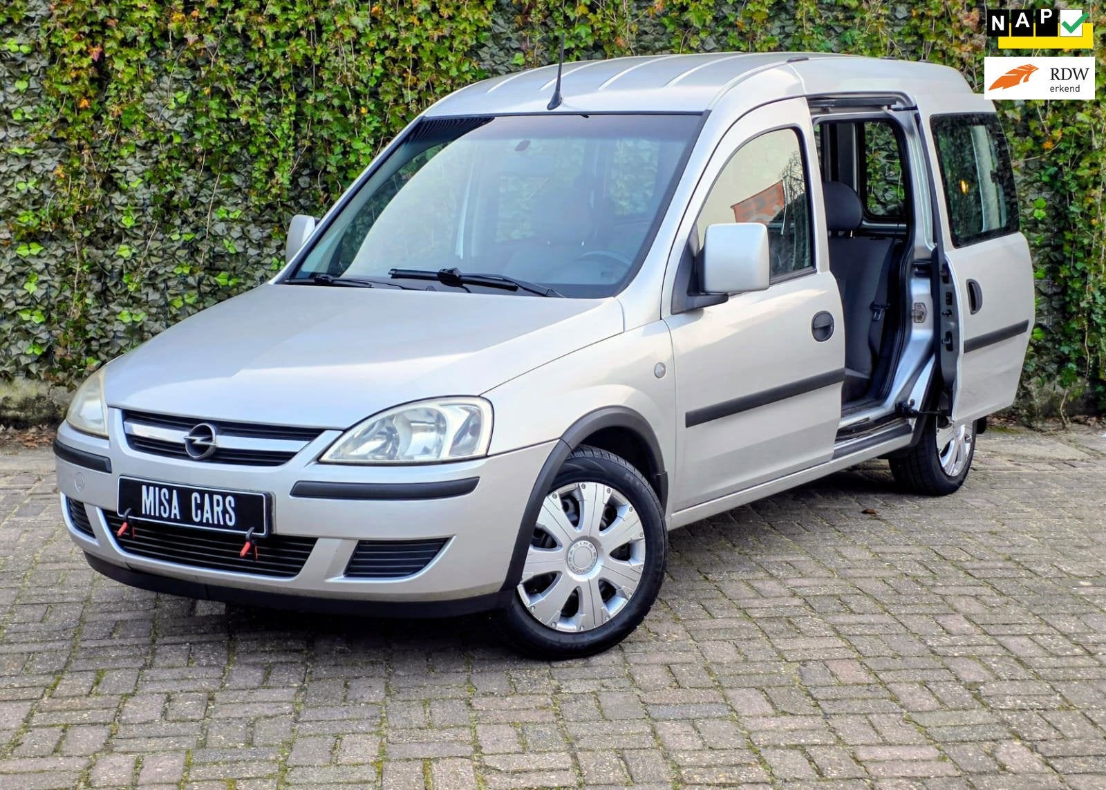 Opel Tour 1.4-16V Enjoy 2 schuifdeuren Leder NL Auto APK Tre, Auto's, Opel, Voorwielaandrijving, Gebruikt, 4 cilinders, 49 €/maand