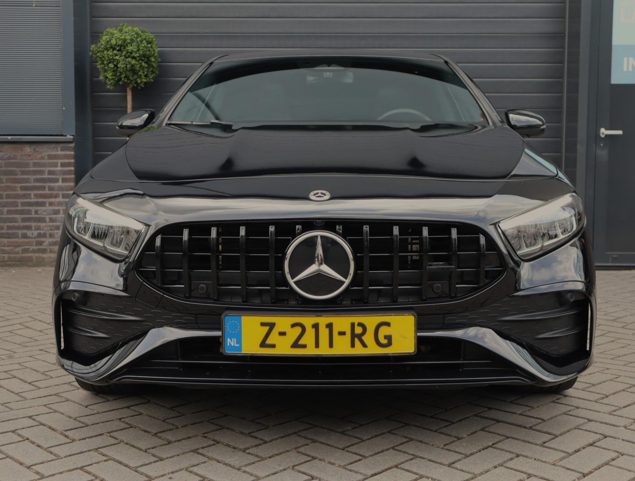 Mercedes-Benz A-klasse 250 e Star Edition AMG Line | Pano |, Gebruikt, 16 kWh, Zwart, Bedrijf