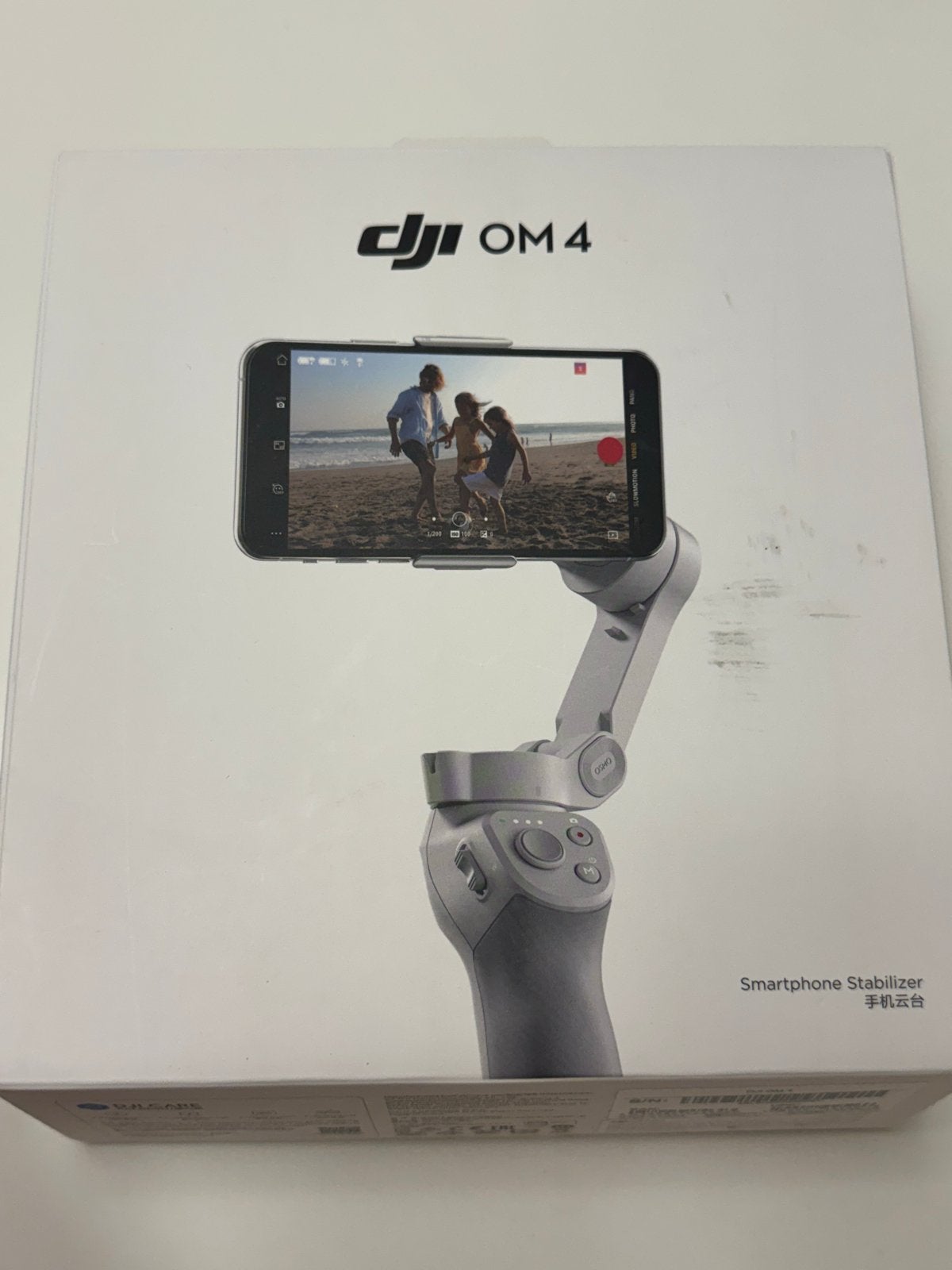 DJI OM 4 Smartphone Stabilizer - Zo goed als nieuw, DJI, Gimbal, Ophalen of Verzenden, Nieuw