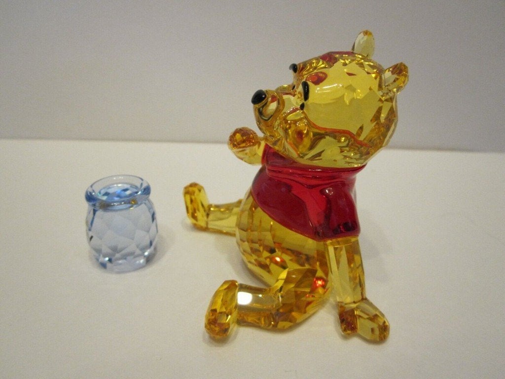 Swarovski Winnie de Pooh met honingpot nieuw, Ophalen of Verzenden, Nieuw, Figuurtje
