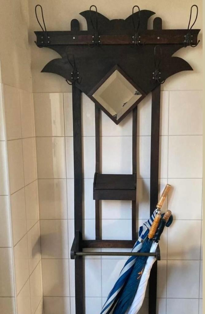 Antieke staande kapstok, Ophalen