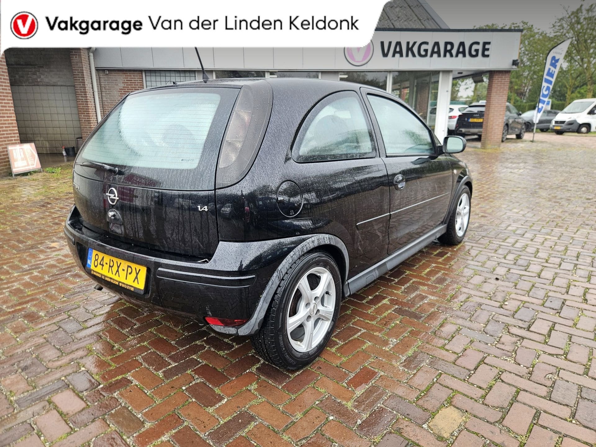 Opel Corsa 1.4-16V Cosmo, Auto's, Opel, Voorwielaandrijving, Gebruikt, 4 cilinders, Zwart