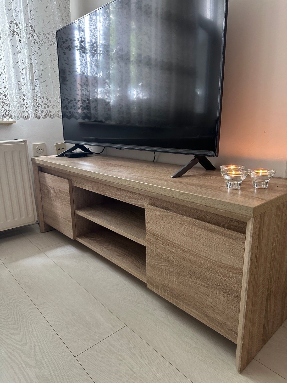 Tv en vitrinekast combi, Ophalen