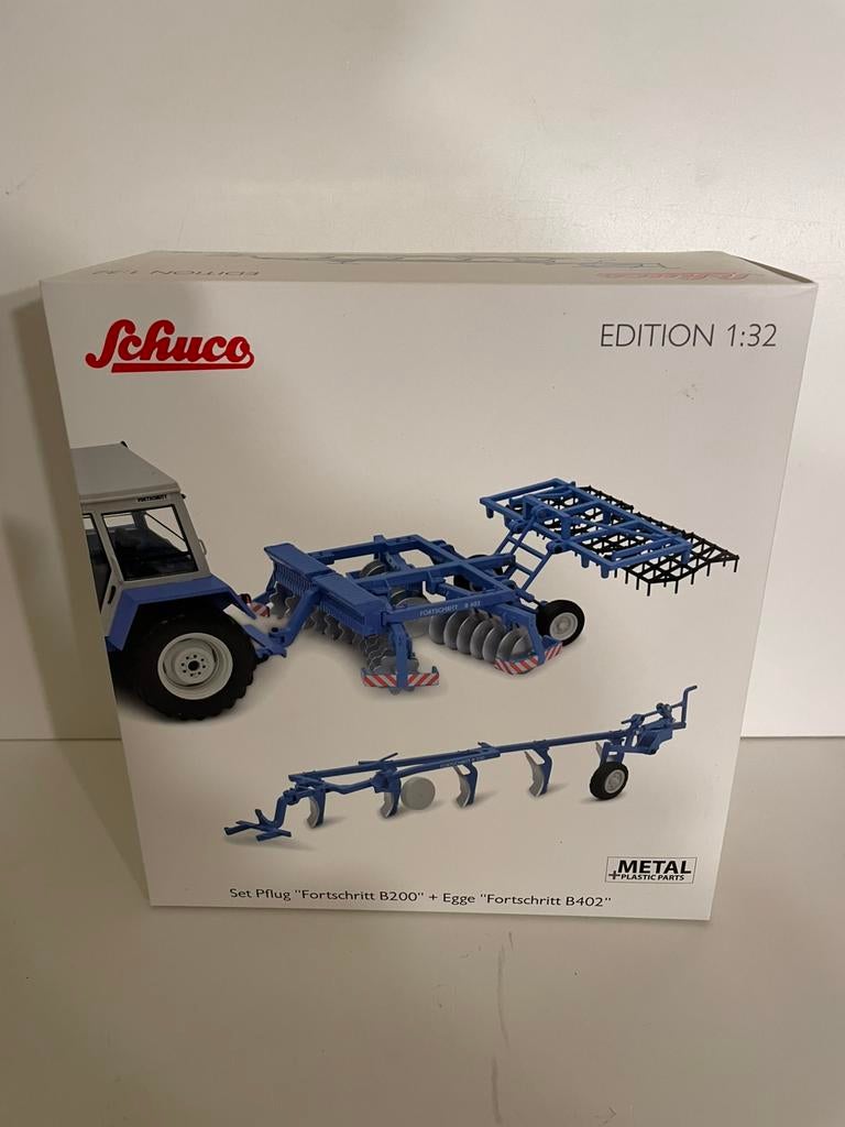 Schuco fortschritt set ploeg en eg nieuw in de doos 1:32, Hobby en Vrije tijd, Modelauto's | 1:32, Nieuw, Tractor of Landbouw
