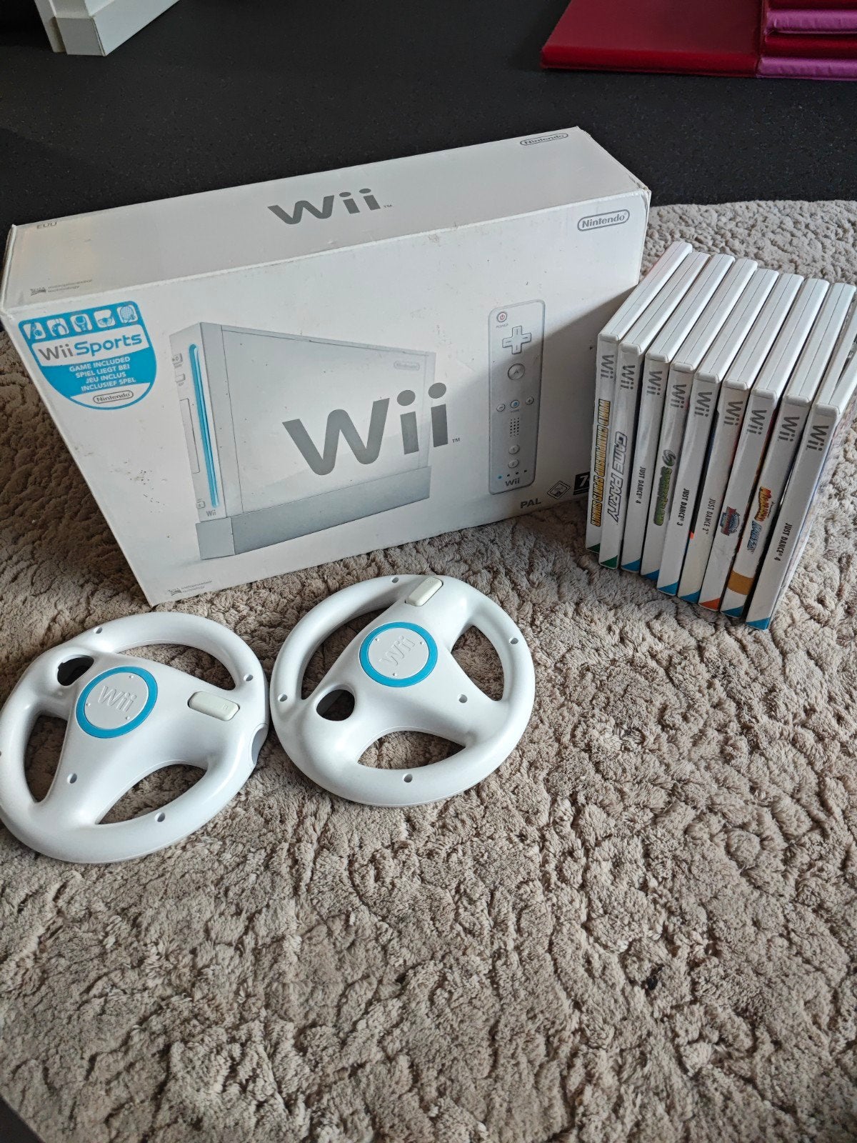 Wii Console met 2 controllers, stuurwielen en 9 games, Ophalen of Verzenden, Gebruikt, Met 2 controllers, Met stuurtje