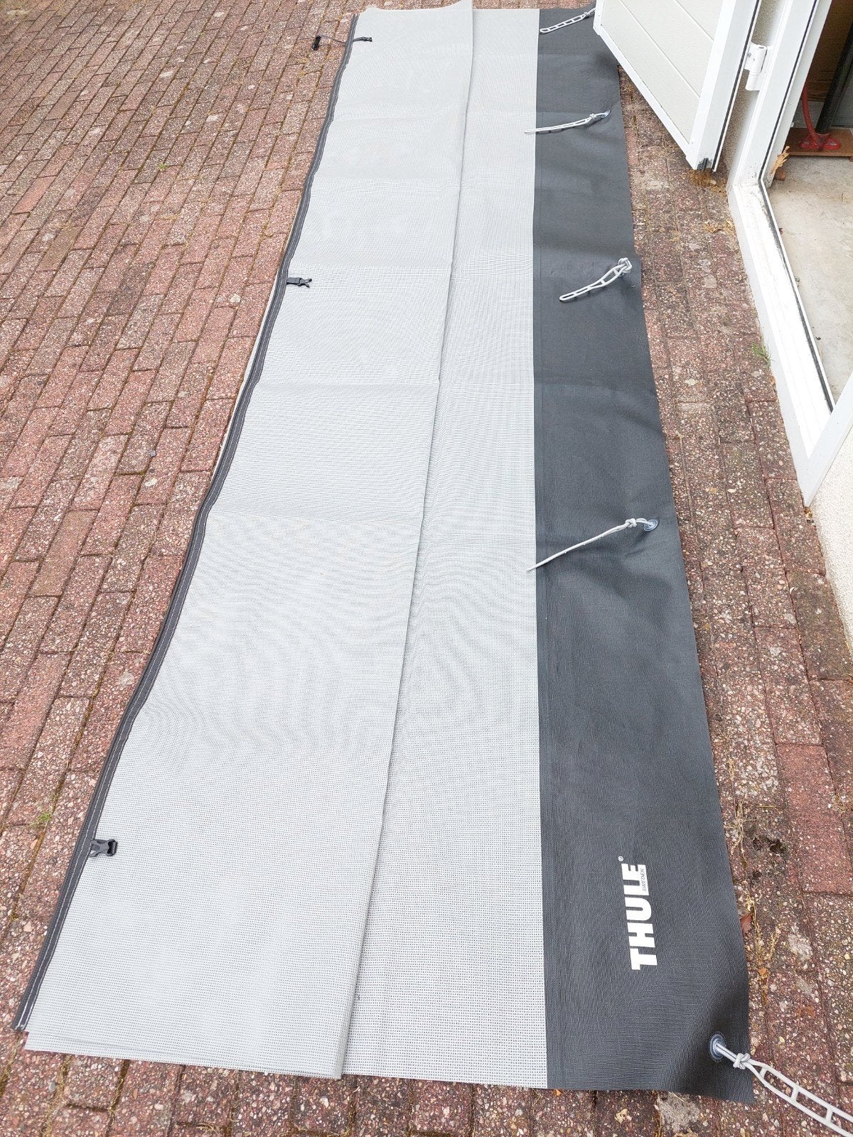 Thule sunblocker 330 cm, Ophalen