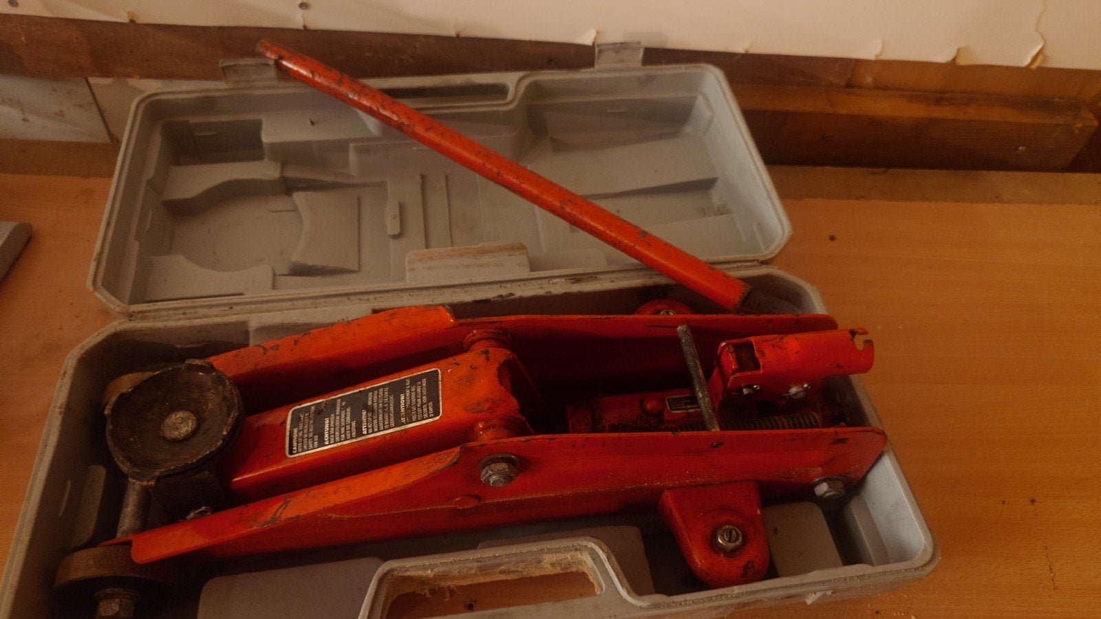 Gebruikte garagekrik met koffer, Ophalen