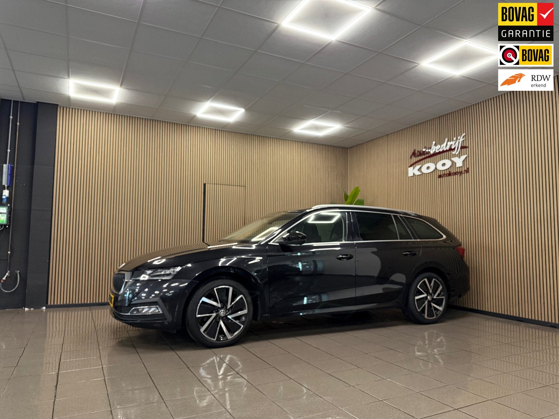 Skoda Octavia Combi 1.4 TSI iV PHEV Business Edition Plus *, Auto's, Gebruikt, Zwart, Hybride Elektrisch/Benzine, 84 €/maand