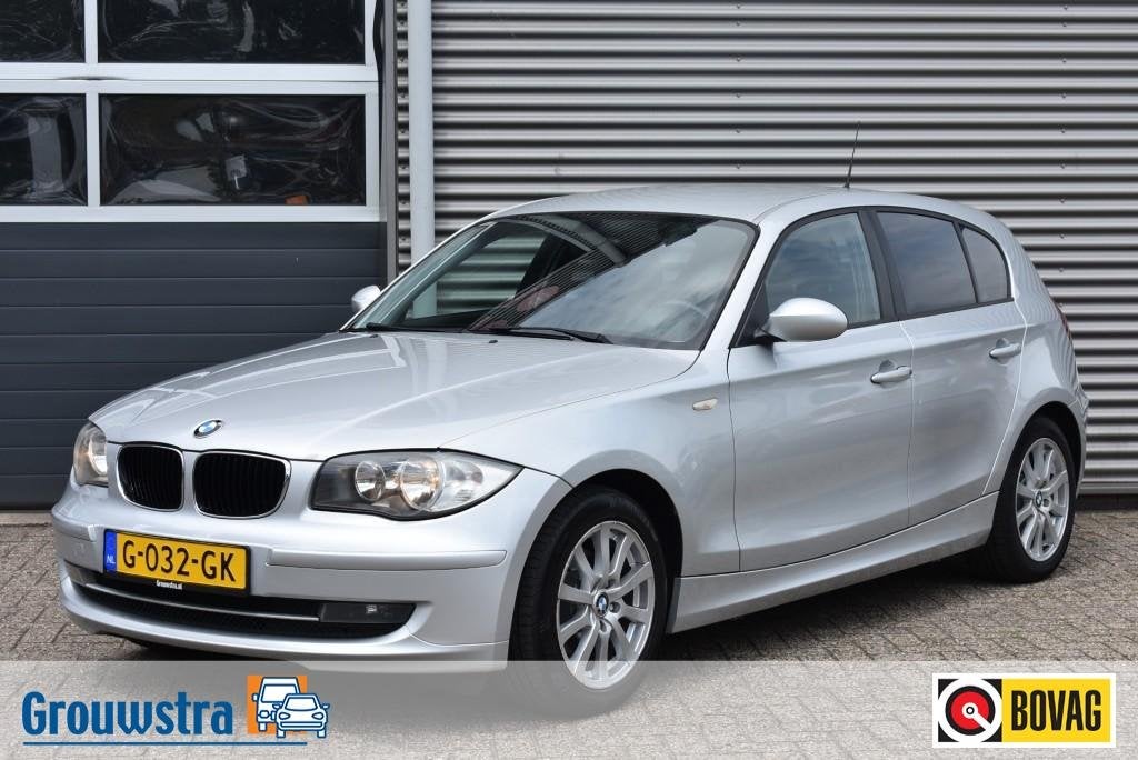 Bmw 1-SERIE 116I INTRODUCTION / STOELVERW. / CLIMA / PDC, Auto's, BMW, 1-Serie, Achterwielaandrijving, Gebruikt, 4 cilinders