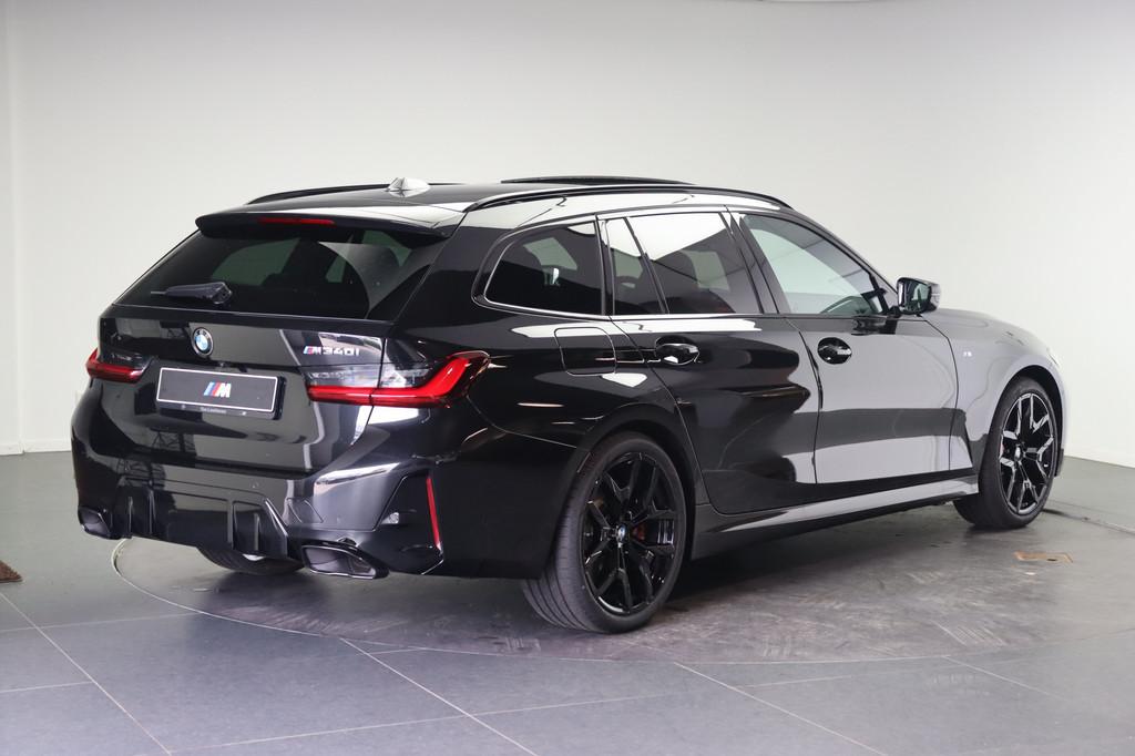 BMW 3 Serie Touring M340i xDrive Automaat / Panoramadak / Tr, Auto's, BMW, Automaat, Zwart, 1805 kg, 3-Serie