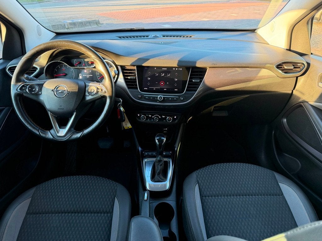 Opel CROSSLAND X 1.2 Turbo Innovation AUT|Clima|Cruis|360CAM, Auto's, Opel, 840 kg, Gebruikt, Leder en Stof, Bedrijf