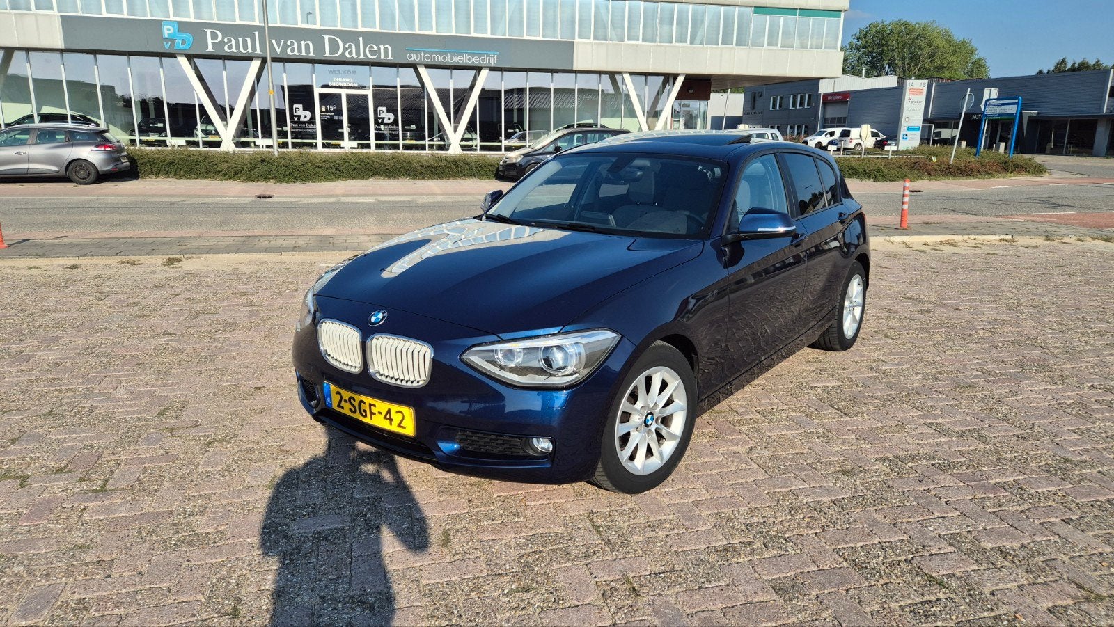 BMW 1-Serie 114I 75KW 5-DR 2013 Blauw Urban, 1-Serie, Achterwielaandrijving, Zwart, 4 cilinders