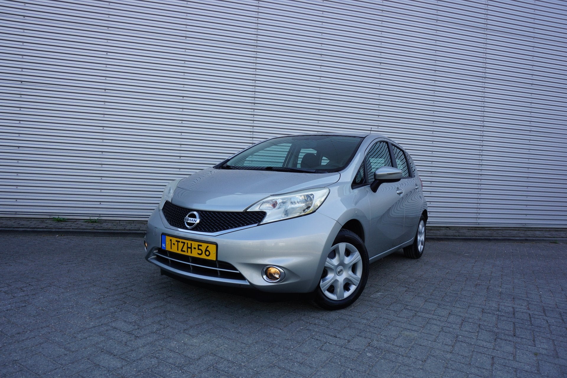 Nissan Note 1.2 Acenta 1e Eigenaar - Airco / Cruise / Elektr, Auto's, Nissan, Euro 5, Stof, 82 pk, 1198 cc