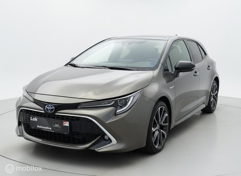 Toyota Corolla 2.0 Hybrid Executive JBL HUD|CAMERA|JBL|ACC|, Gebruikt, Zwart, 4 cilinders, Bruin