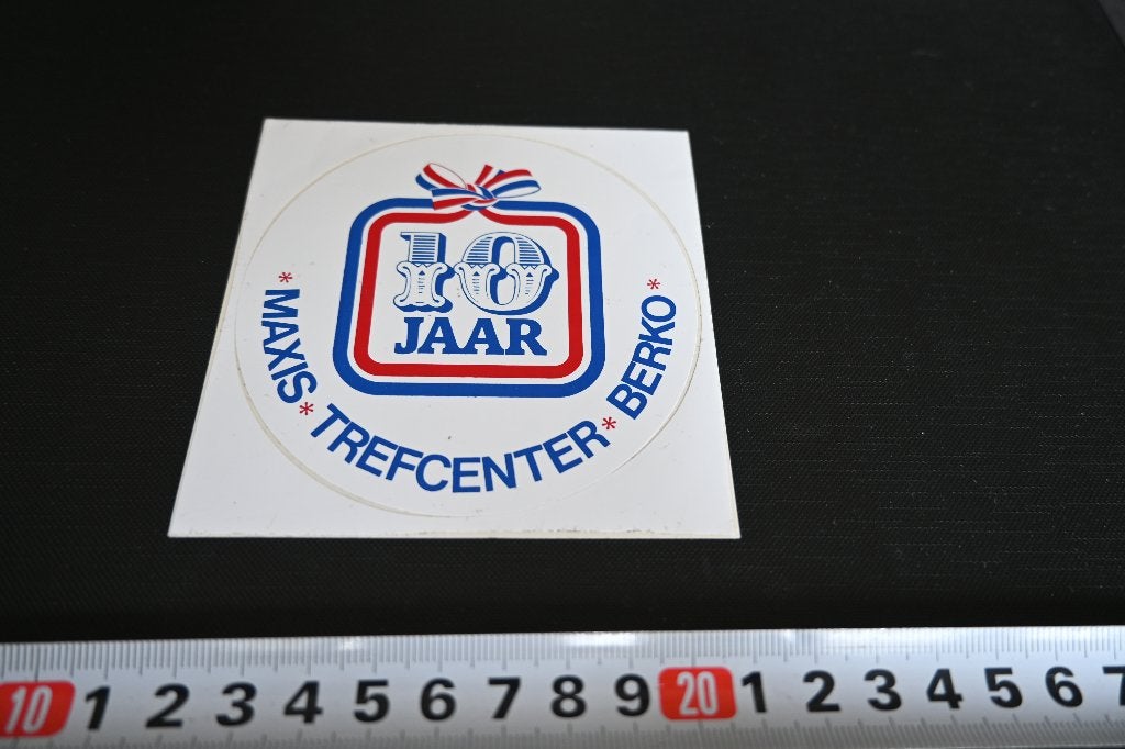 sticker 10 jaar MAXIS TREFCENTER BERKO  Supermarkt, Ophalen, Zo goed als nieuw